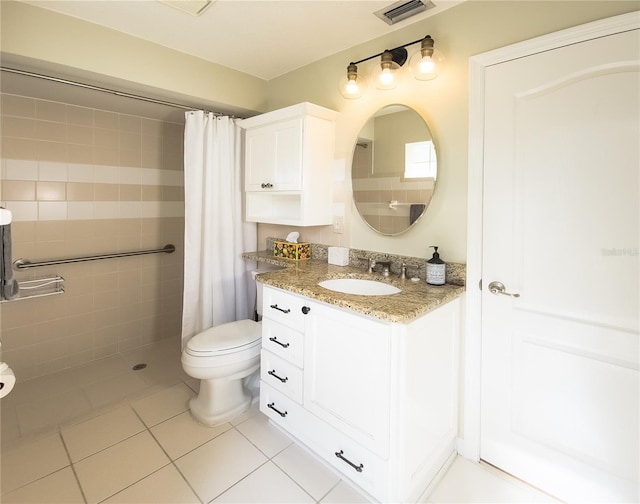 32 Woodward Ln, Palm Coast, FL 32164 - full bathroom with tile patterned floors, tiled shower, and vanity