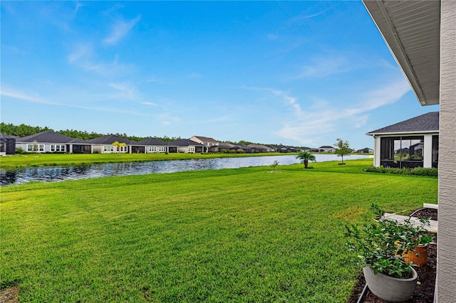 view of yard with a water view