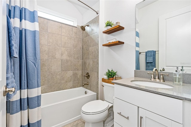 full bathroom with shower / tub combo, vanity, toilet, and tile patterned floors