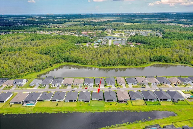 birds eye view of property featuring a water view