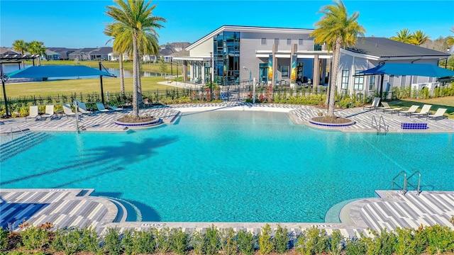 view of swimming pool featuring a patio