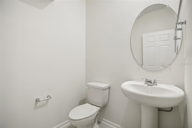 bathroom featuring toilet