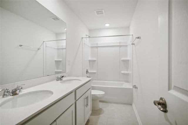 full bathroom with vanity, toilet, tile patterned flooring, and tub / shower combination