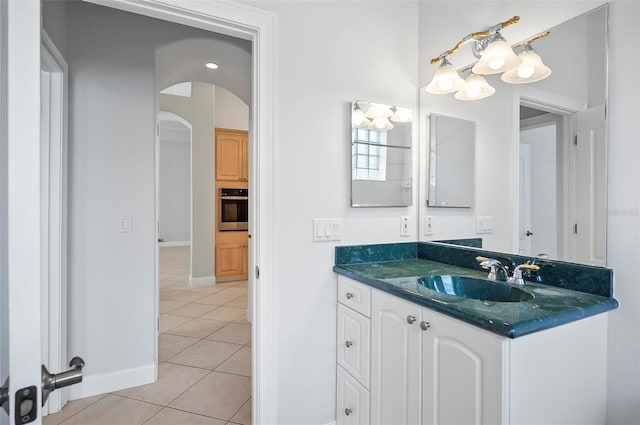 bathroom featuring tile patterned floors and vanity