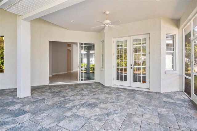 view of patio featuring ceiling fan and french doors