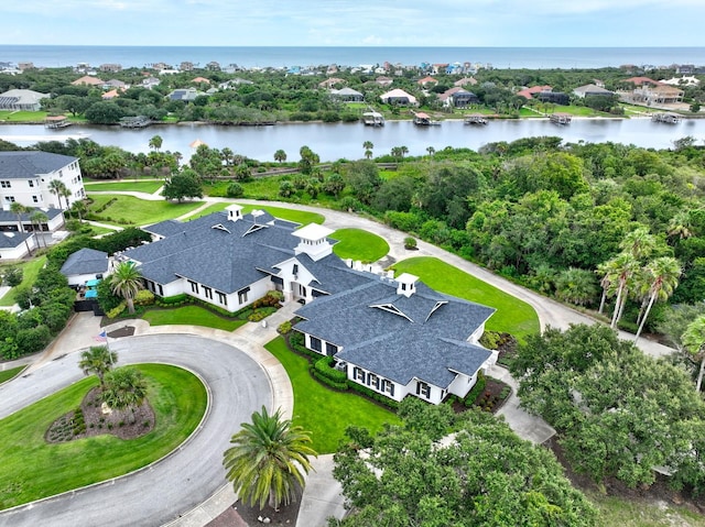 drone / aerial view with a water view