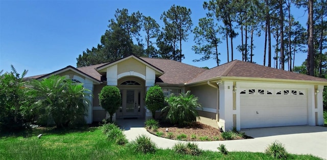 ranch-style home featuring a garage