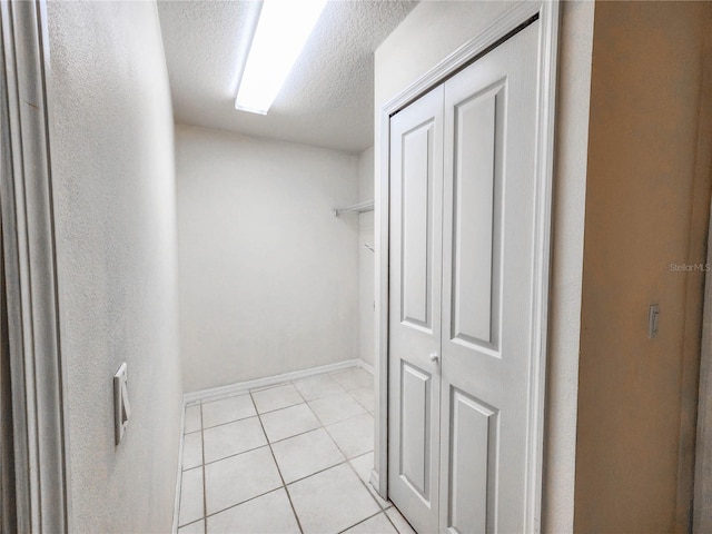 8 Burning Sands Ln, Palm Coast, FL 32137 - spacious closet featuring light tile patterned floors