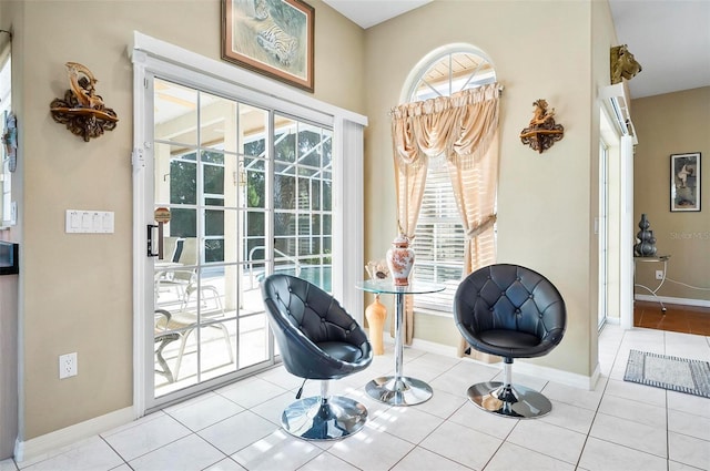 living area with light tile patterned floors