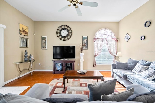 tiled living room with ceiling fan