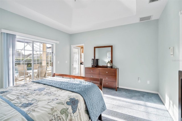 bedroom with carpet floors and access to outside