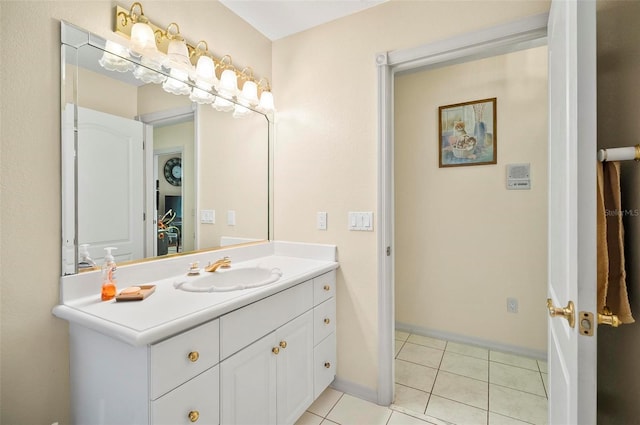 bathroom featuring tile patterned flooring and vanity