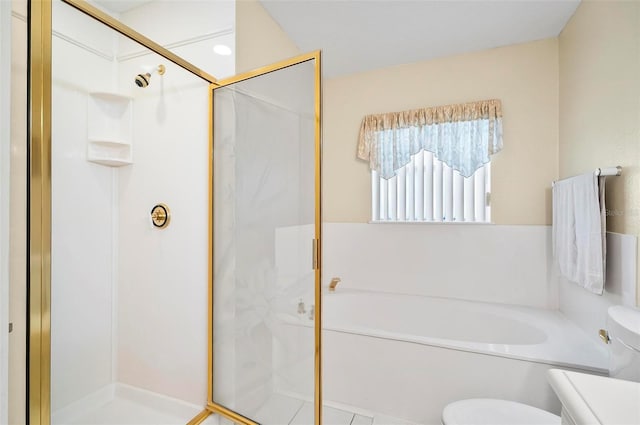 full bathroom featuring shower with separate bathtub, vanity, toilet, and tile patterned floors