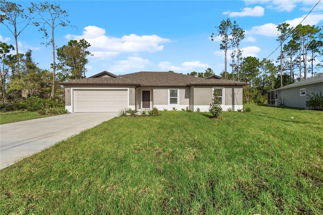 ranch-style home featuring a front lawn and a garage