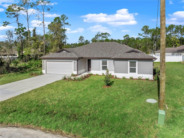 ranch-style home with a garage and a front lawn