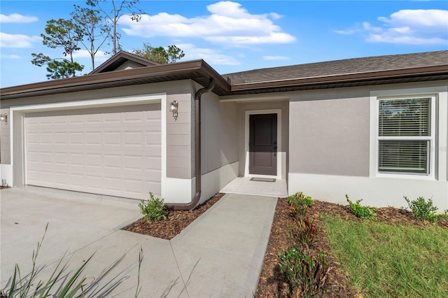 ranch-style home with a garage