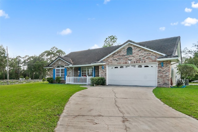 ranch-style home featuring a porch, a garage, and a front lawn