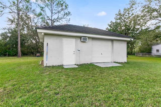 garage with a yard