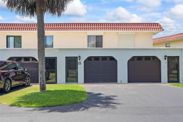 view of front of home with a garage