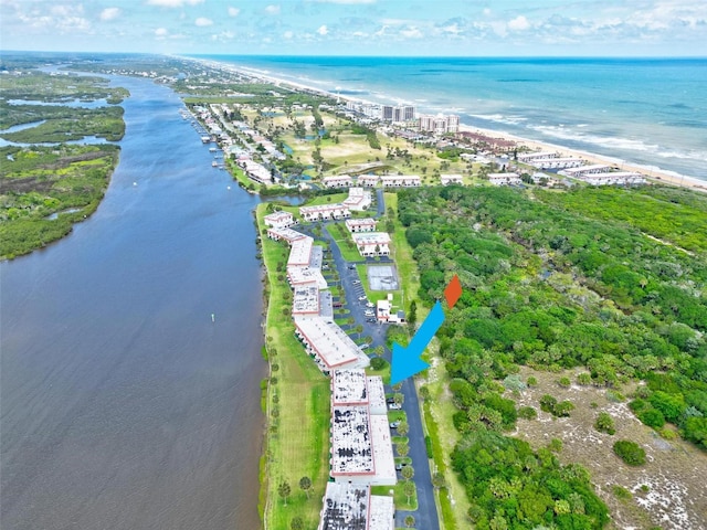 birds eye view of property featuring a water view