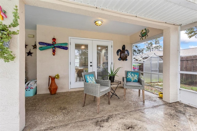 sunroom / solarium with french doors