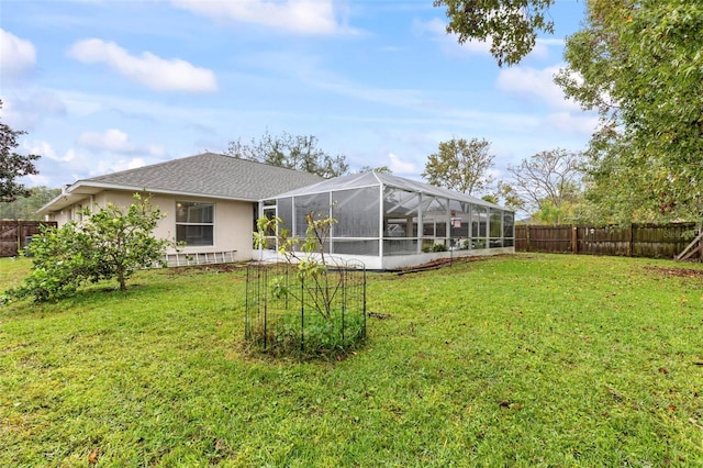 view of yard featuring a lanai