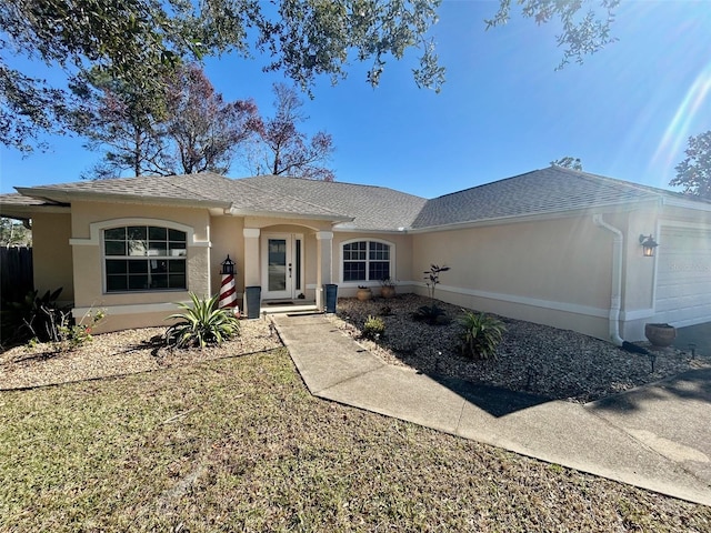 single story home with a garage