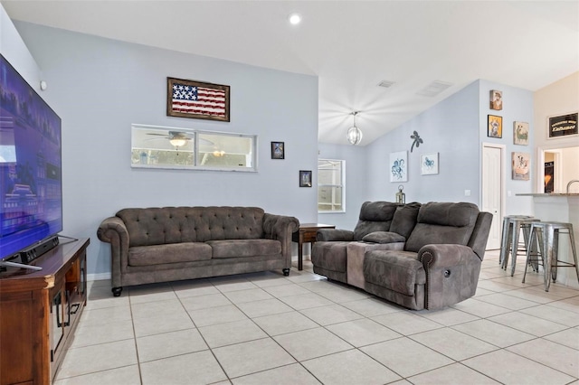 tiled living room with lofted ceiling