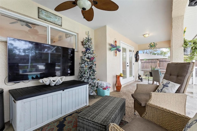 view of patio / terrace featuring french doors and ceiling fan