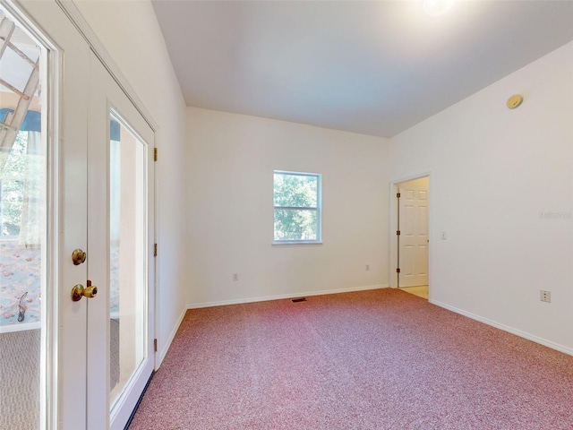 view of carpeted spare room