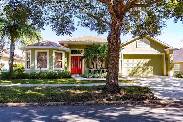 view of front of property with a garage