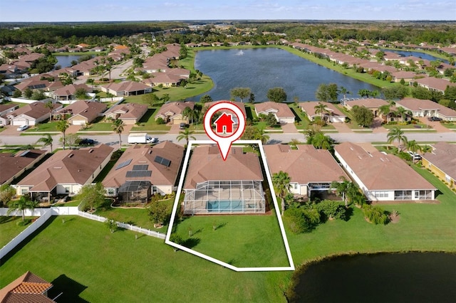 birds eye view of property featuring a water view