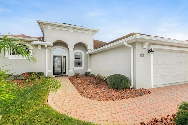 property entrance with a garage