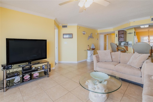 1183 Ocean Shore Blvd Unit 6040, Ormond Beach, FL 32176 - living room featuring crown molding, a ceiling fan, light tile patterned floors, baseboards, and a textured ceiling