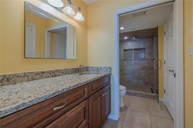 1183 Ocean Shore Blvd Unit 6040, Ormond Beach, FL 32176 - full bath with toilet, vanity, a shower stall, tile patterned floors, and baseboards