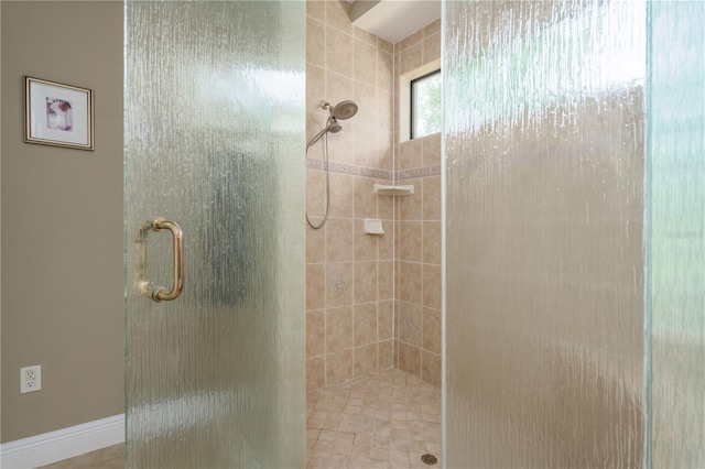 full bath featuring a shower stall