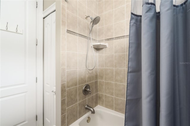 bathroom with shower / bathtub combination with curtain