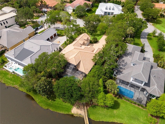 bird's eye view with a water view and a residential view