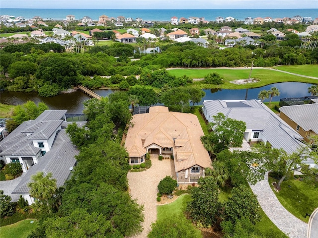 bird's eye view with a water view and a residential view