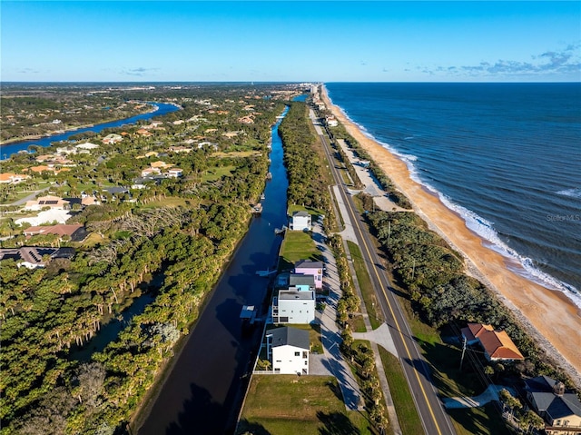 bird's eye view with a view of the beach and a water view