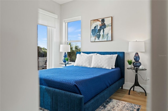 bedroom featuring hardwood / wood-style flooring