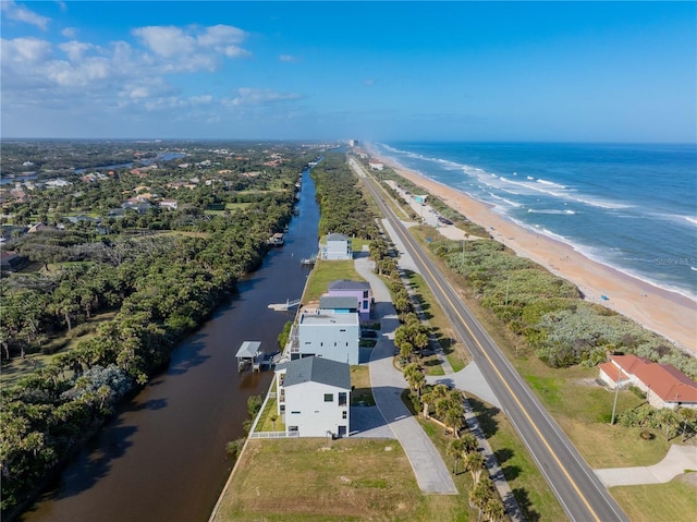 aerial view with a view of the beach and a water view