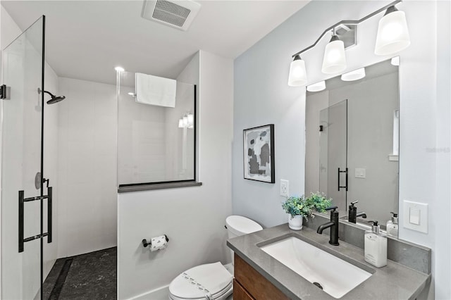 bathroom featuring walk in shower, vanity, and toilet