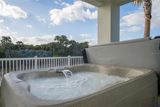 view of patio / terrace with a hot tub