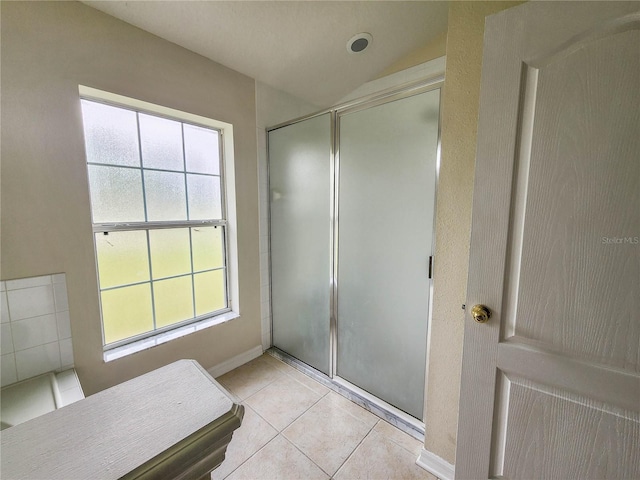 bathroom with tile patterned flooring