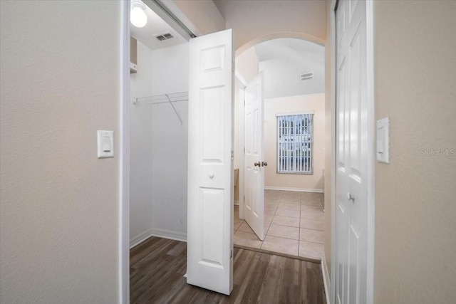 hallway featuring hardwood / wood-style floors