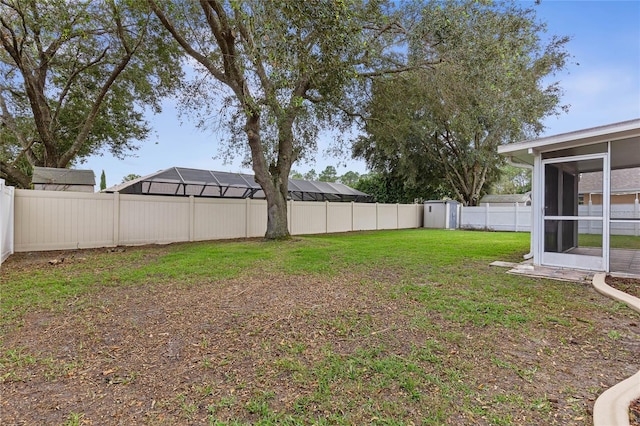 view of yard featuring a sunroom