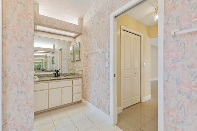 bathroom featuring vanity and tile patterned floors