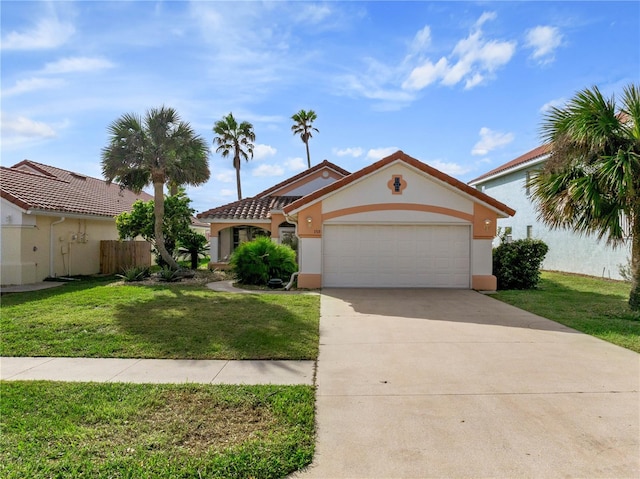 view of front of house with a garage and a front yard