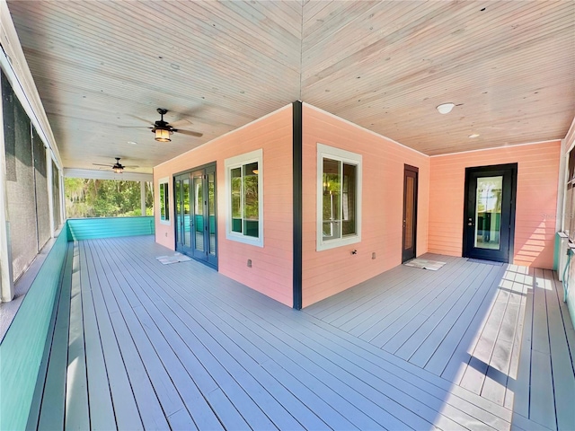 wooden deck with ceiling fan